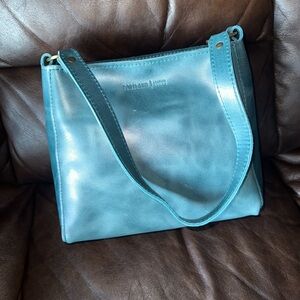 Portland leather goods cowboy jeans triangle